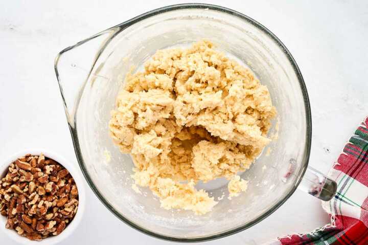 Making cookie dough for Snowball Cookies.