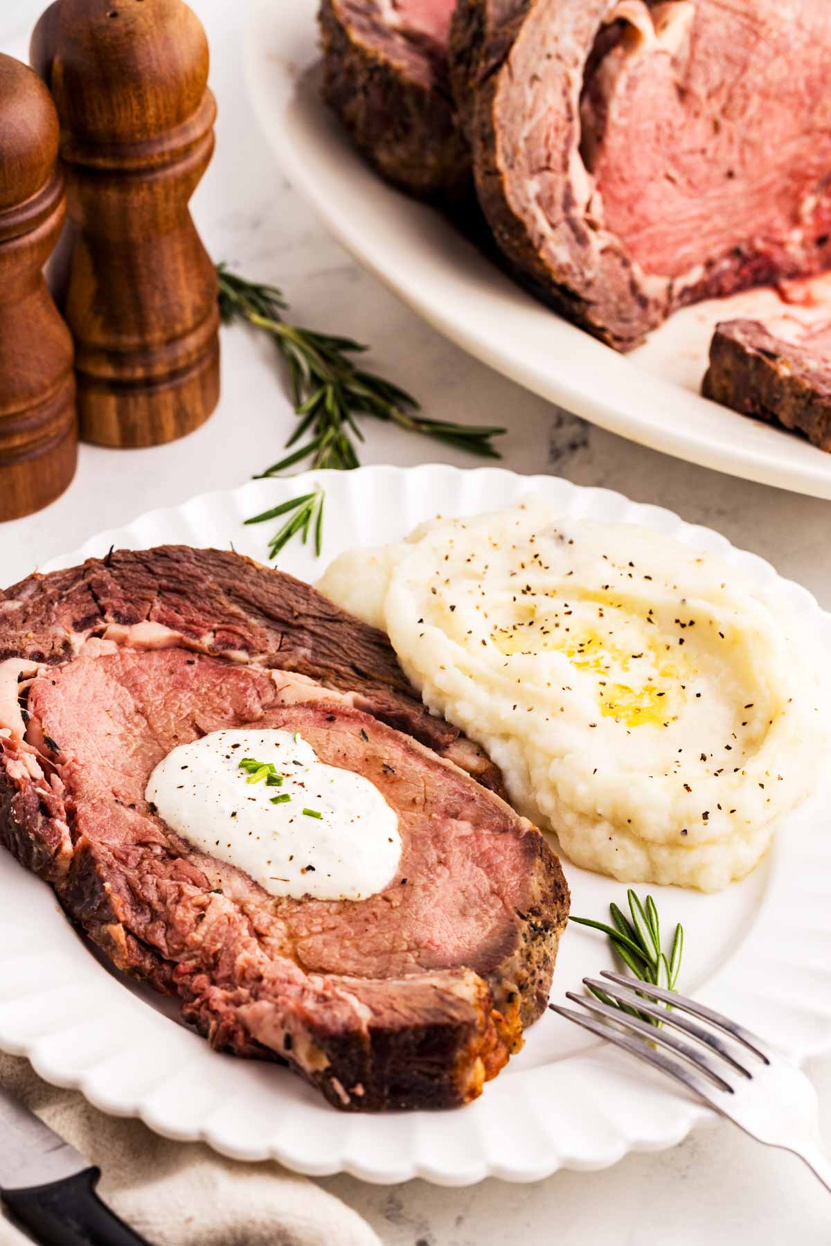 prime rib served with mashed potatoes