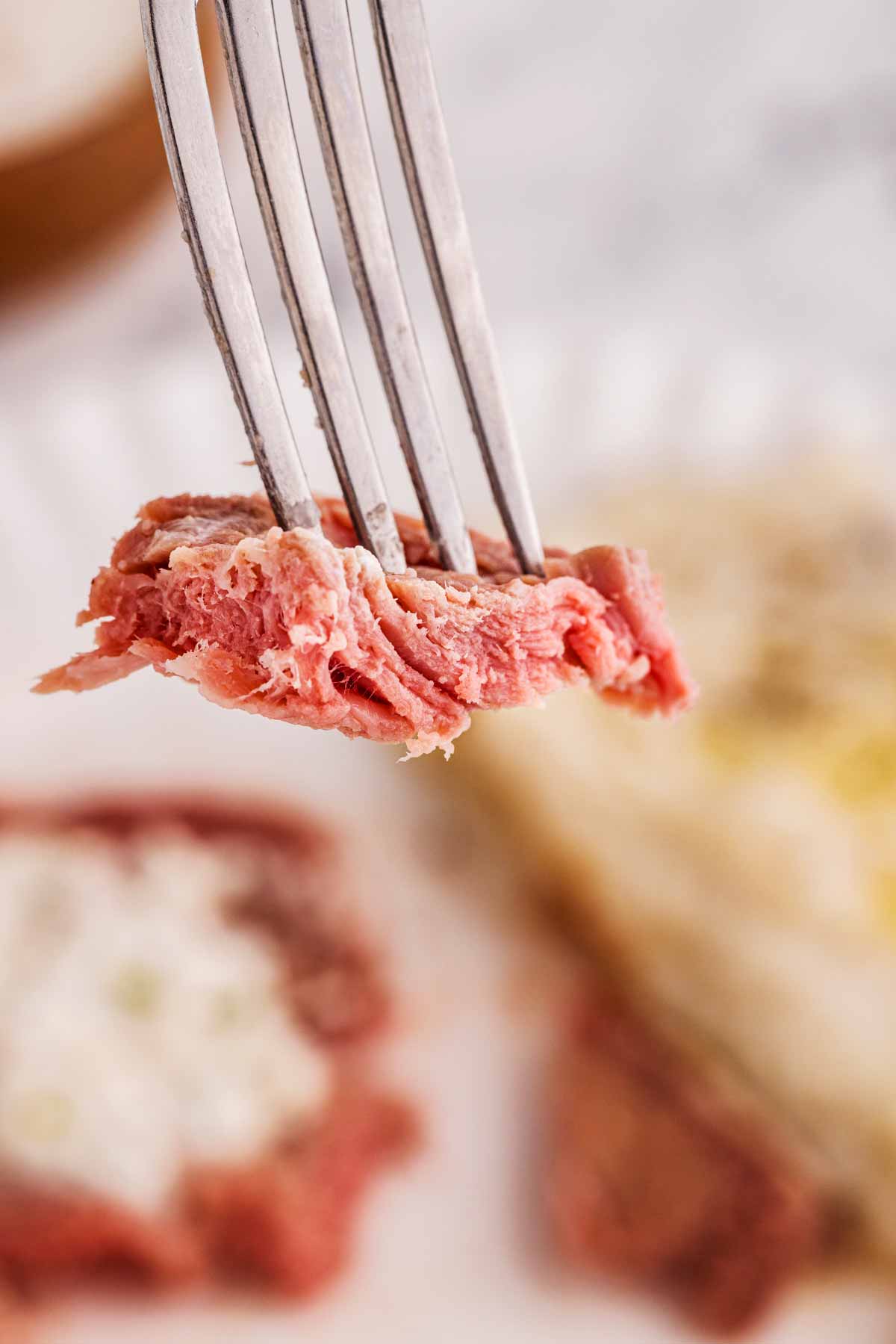 juicy prime rib on a fork