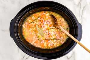 assembling slow cooker ham and bean soup