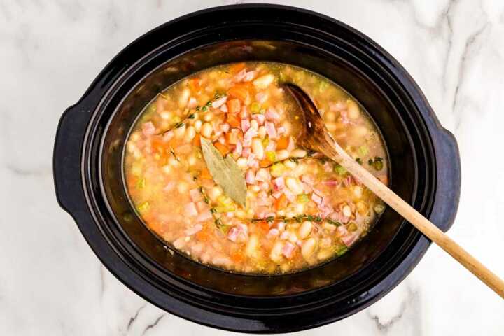 assembling slow cooker ham and bean soup