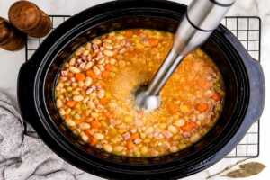 blending some soup in the slow cooker