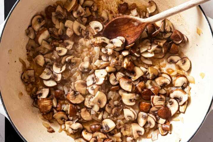 cooking onions and mushrooms in a skillet