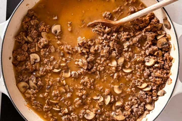 simmering ground beef and vegetables in gravy