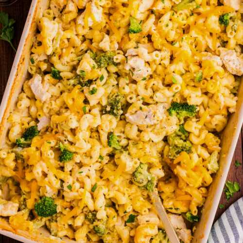 Serving chicken broccoli pasta casserole from the dish.