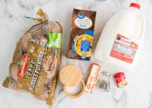 Groceries for mashed potatoes in the slow cooker.
