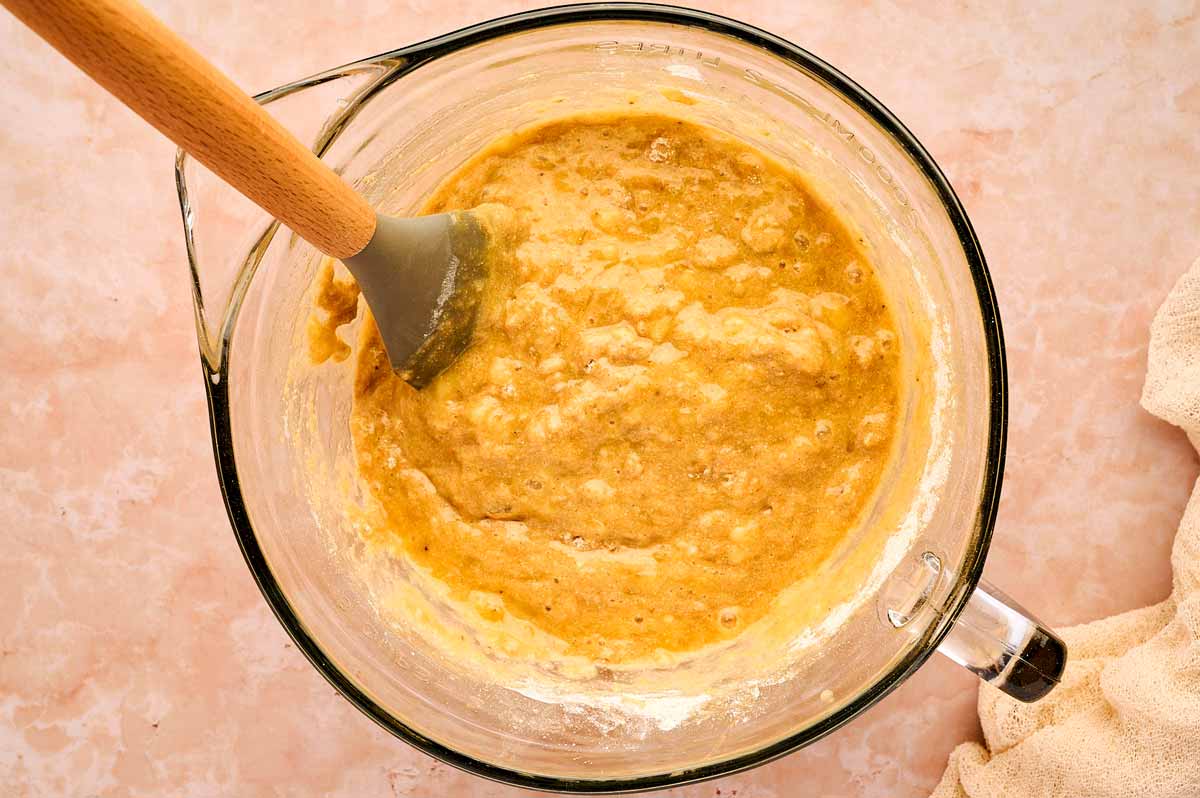 batter for banana bread stirred in a bowl
