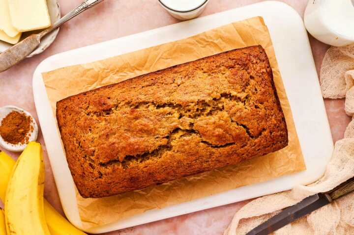 Banana bread being served on a platter.