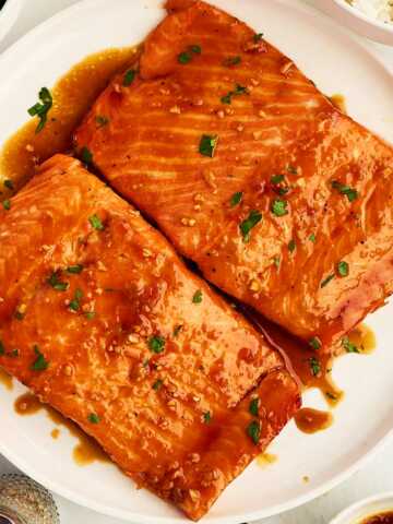 Honey glazed salmon on a plate.