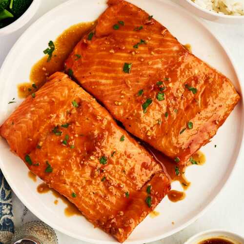 Honey glazed salmon on a plate.