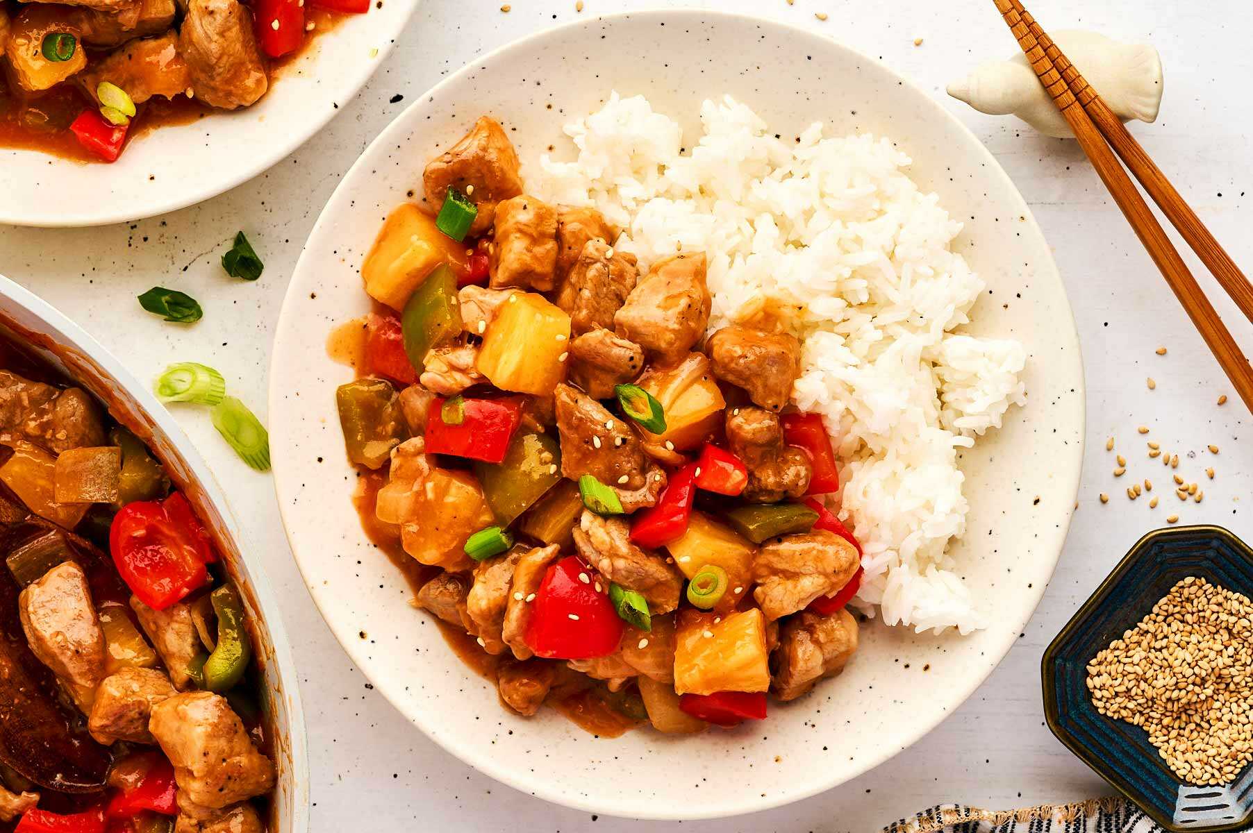 Bowl with sweet and sour pork and rice.