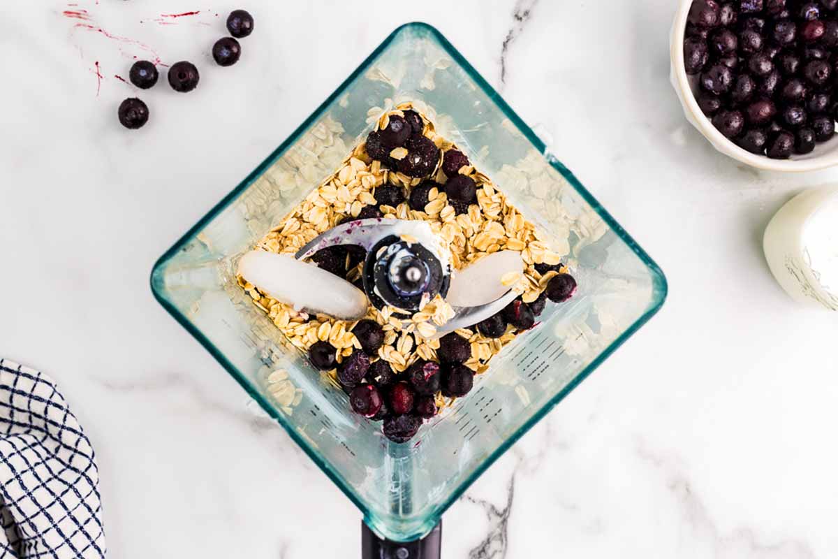 Making a blueberry banana smoothie.