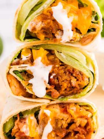 Stack of chicken wraps.