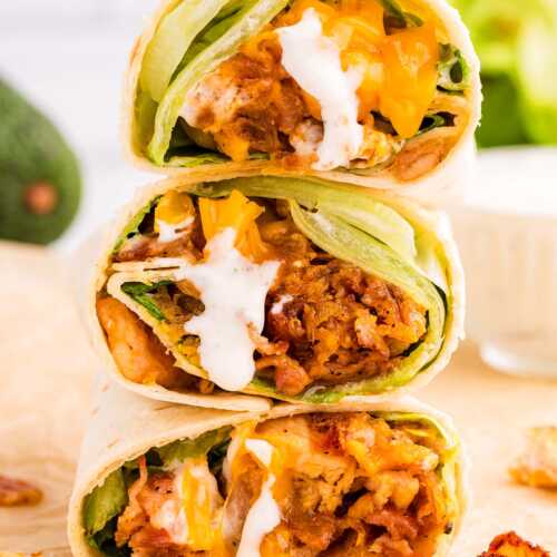 Stack of chicken wraps.