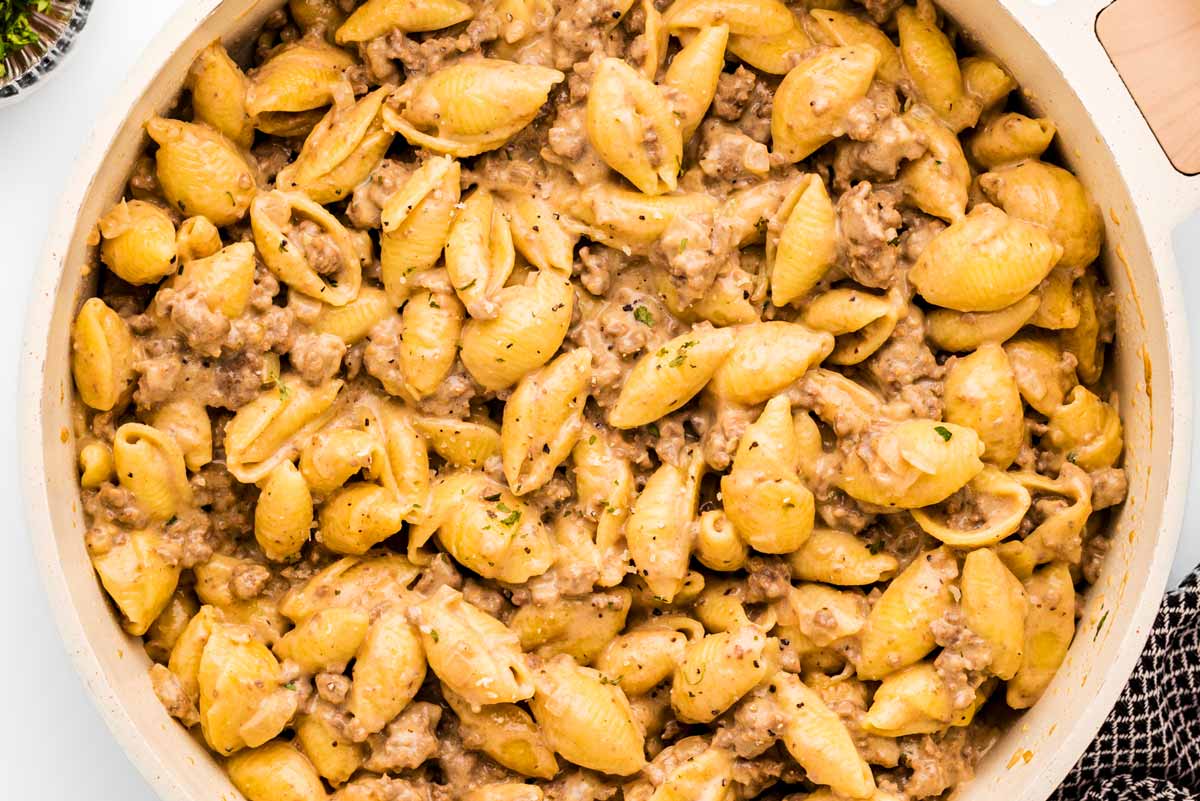 Ground beef and pasta in a pot.