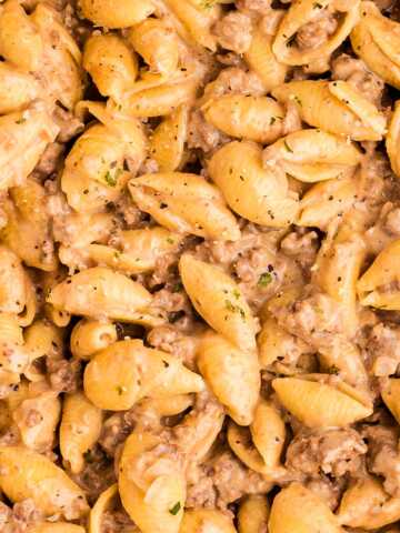 Ground beef and pasta in a pot.