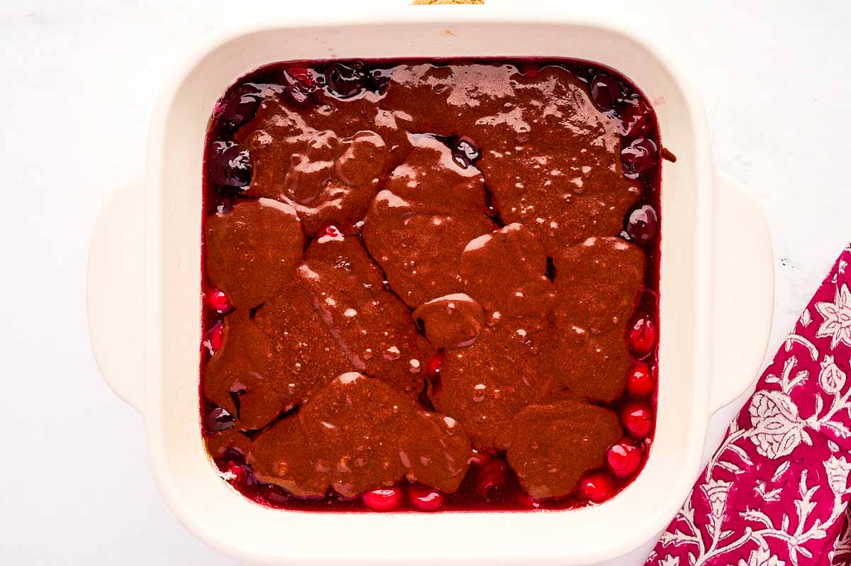 Unbaked chocolate cherry cobbler.