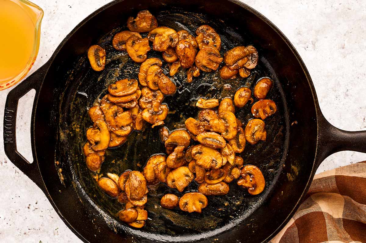 Starting roux in a cast iron skillet with seared mushrooms.