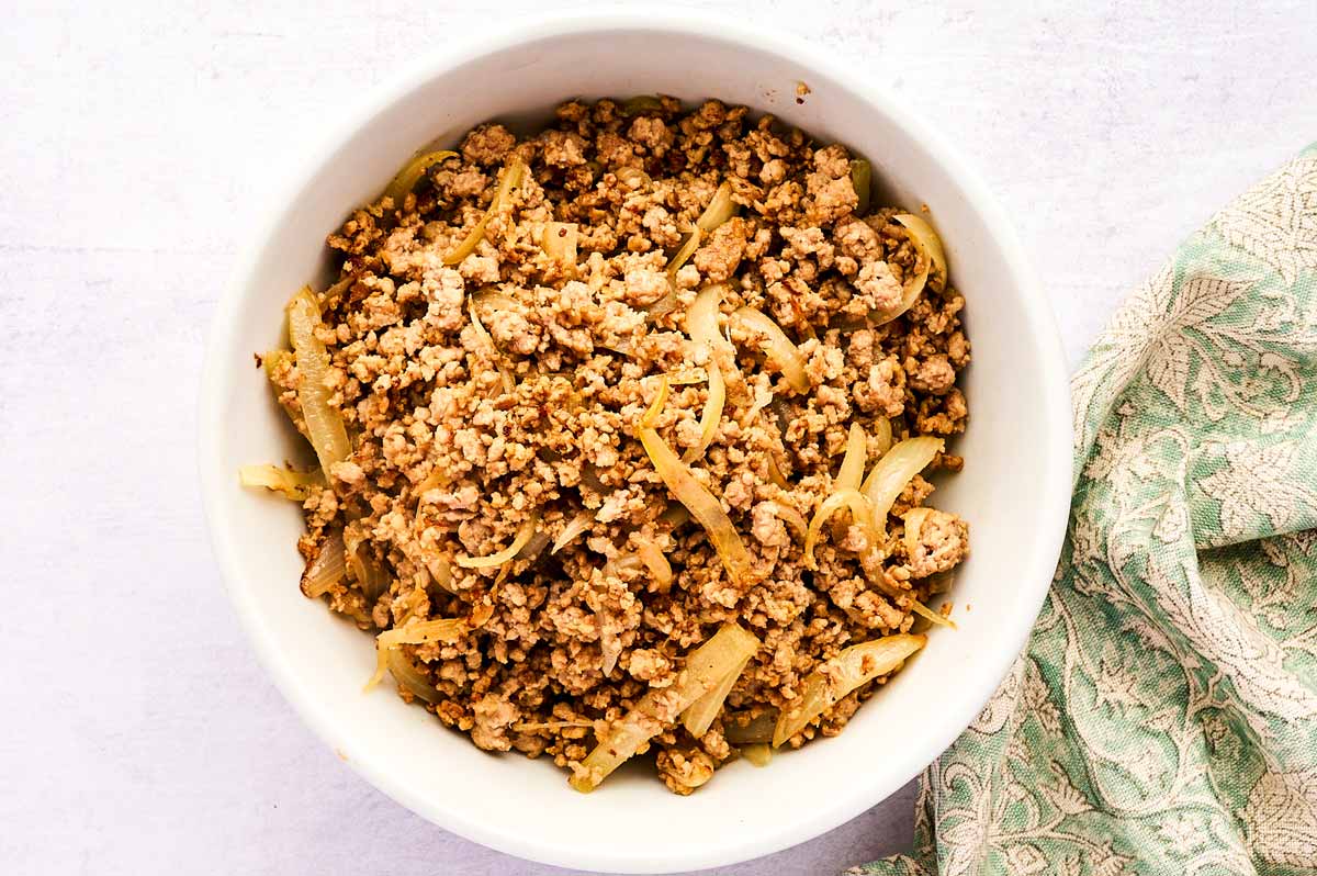 Browned pork in a bowl.