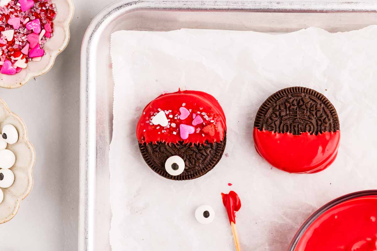 Creating love bug Oreos.
