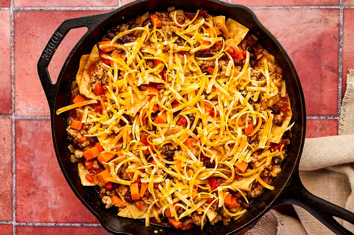 Unbaked enchilada casserole.