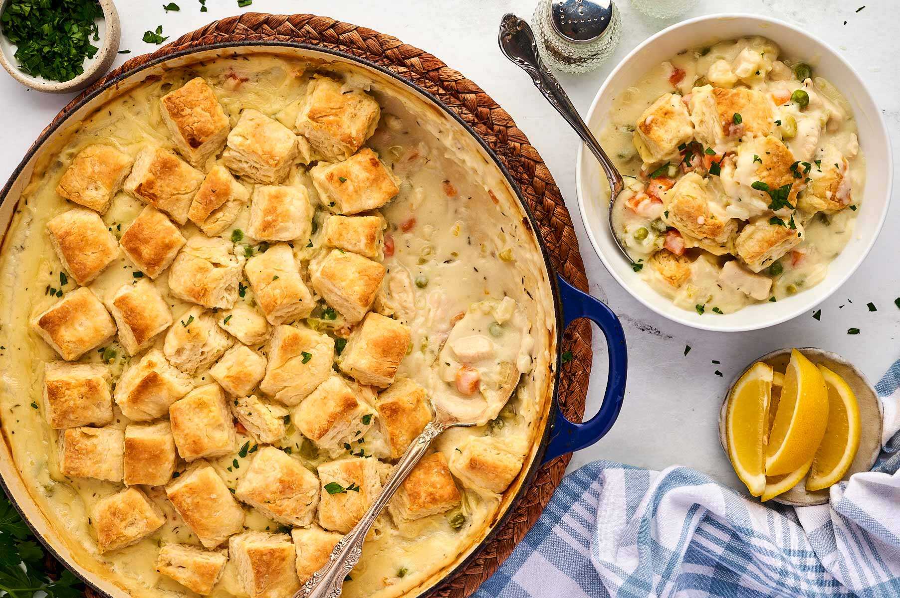 Serving chicken and biscuits from the pan.