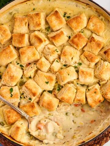 Serving chicken and biscuits from the pan.