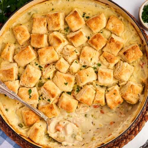 Serving chicken and biscuits from the pan.