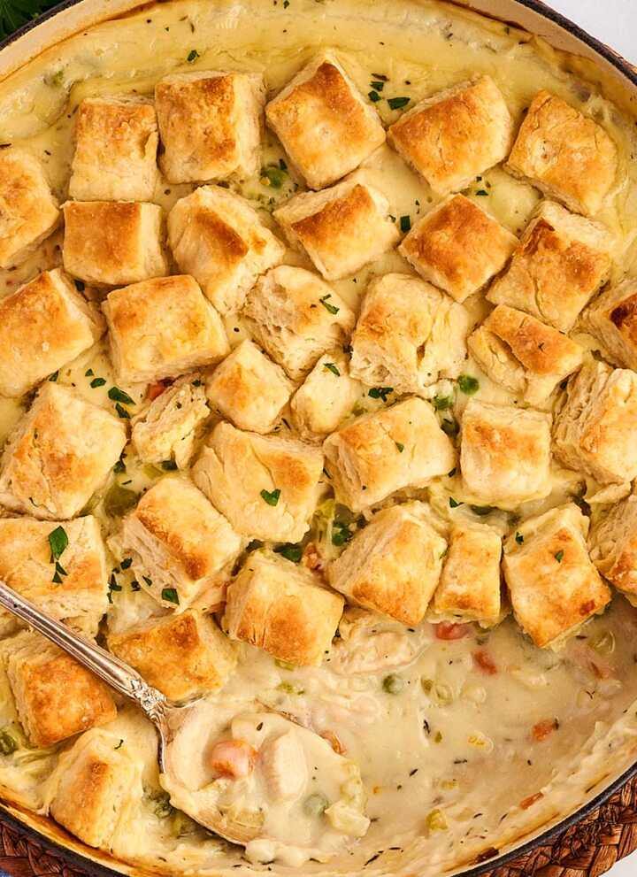 Serving chicken and biscuits from the pan.