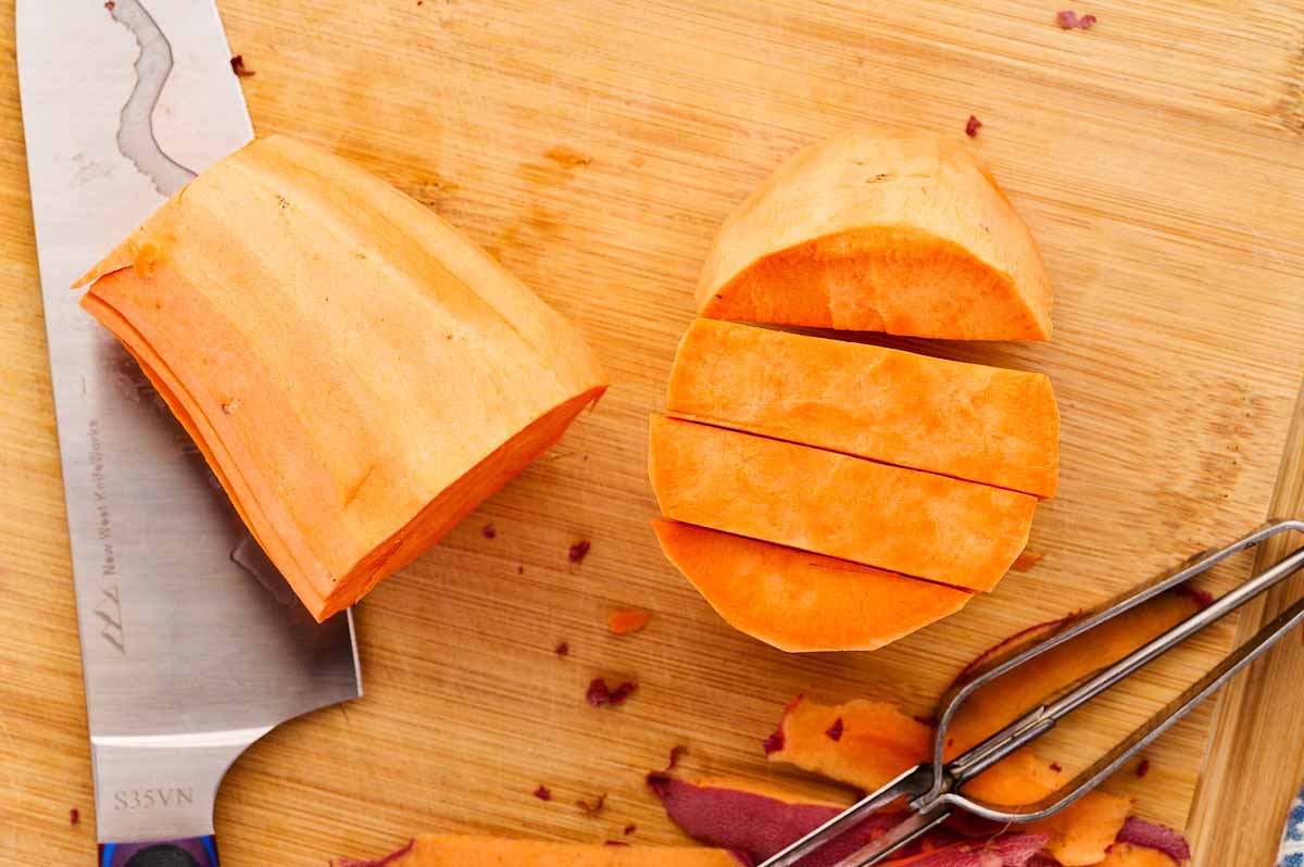 Cutting sweet potatoes.
