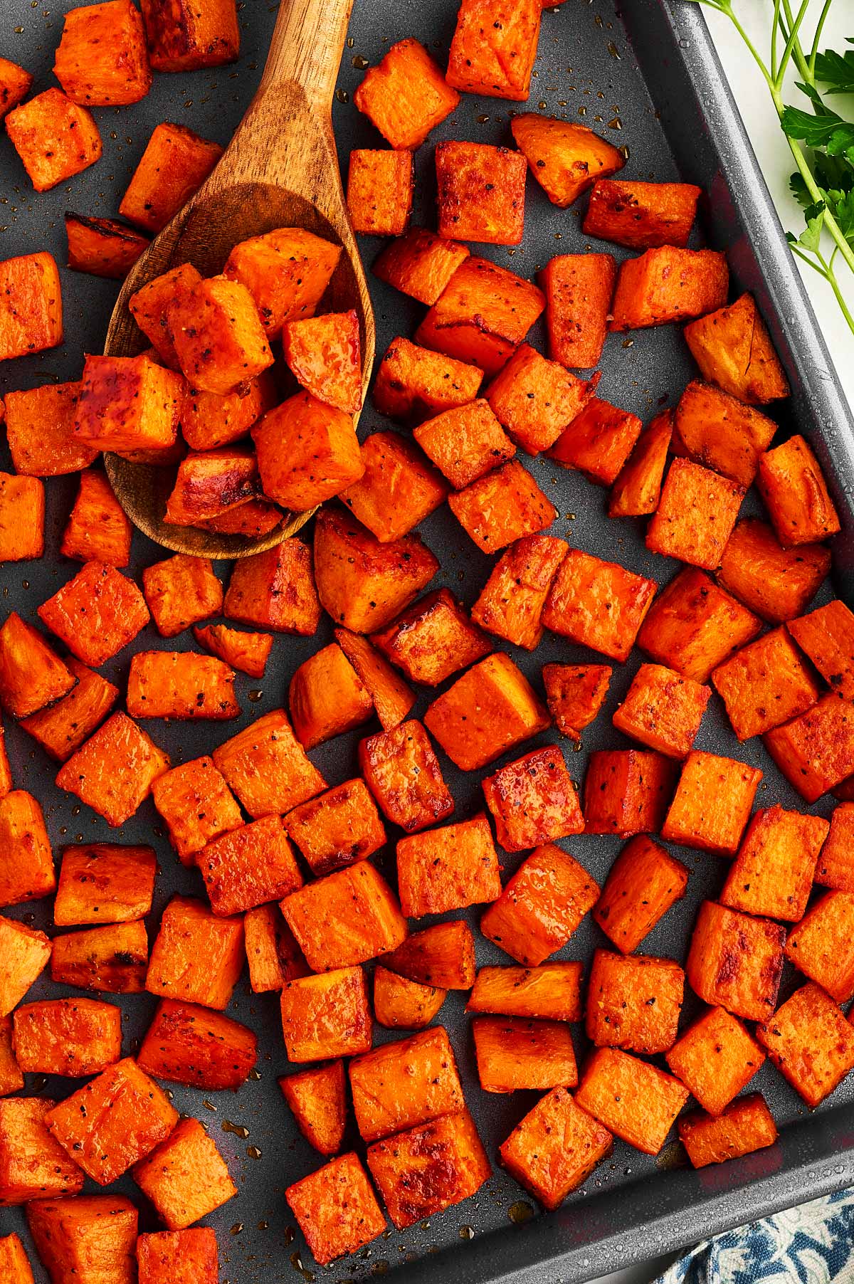 Pan with roasted sweet potato cubes.