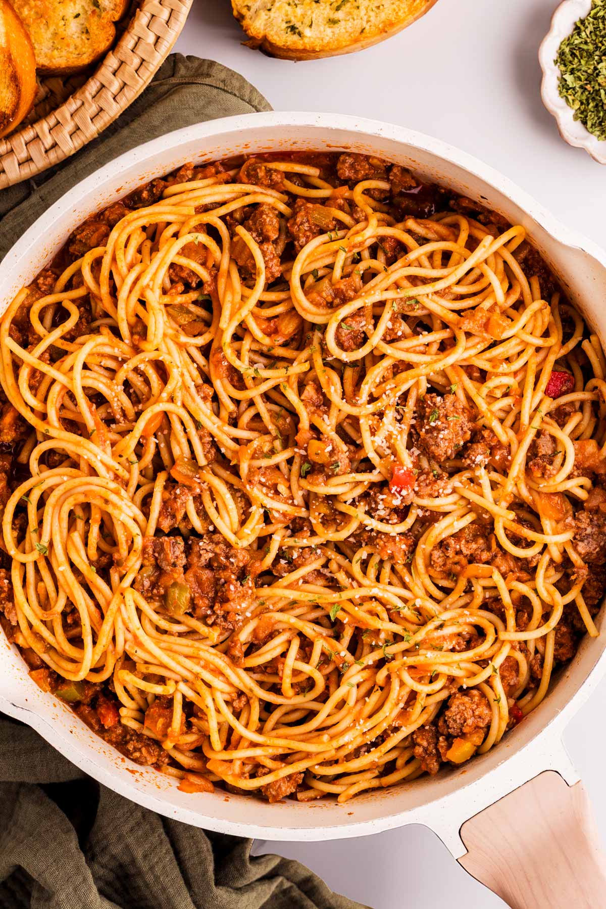 Skillet with spaghetti and meat sauce.