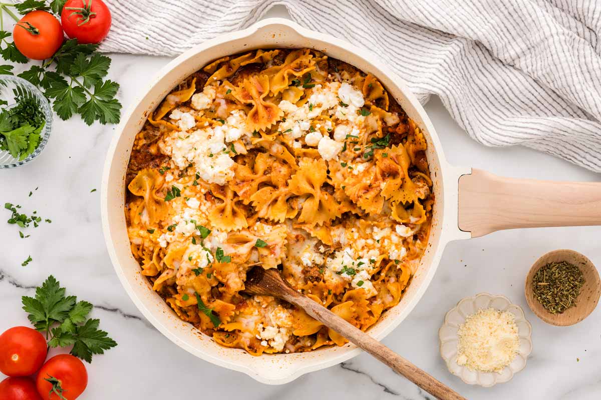 Serving a pan full of skillet lasagna.