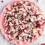 Pink plate with Valentine's Day popcorn.