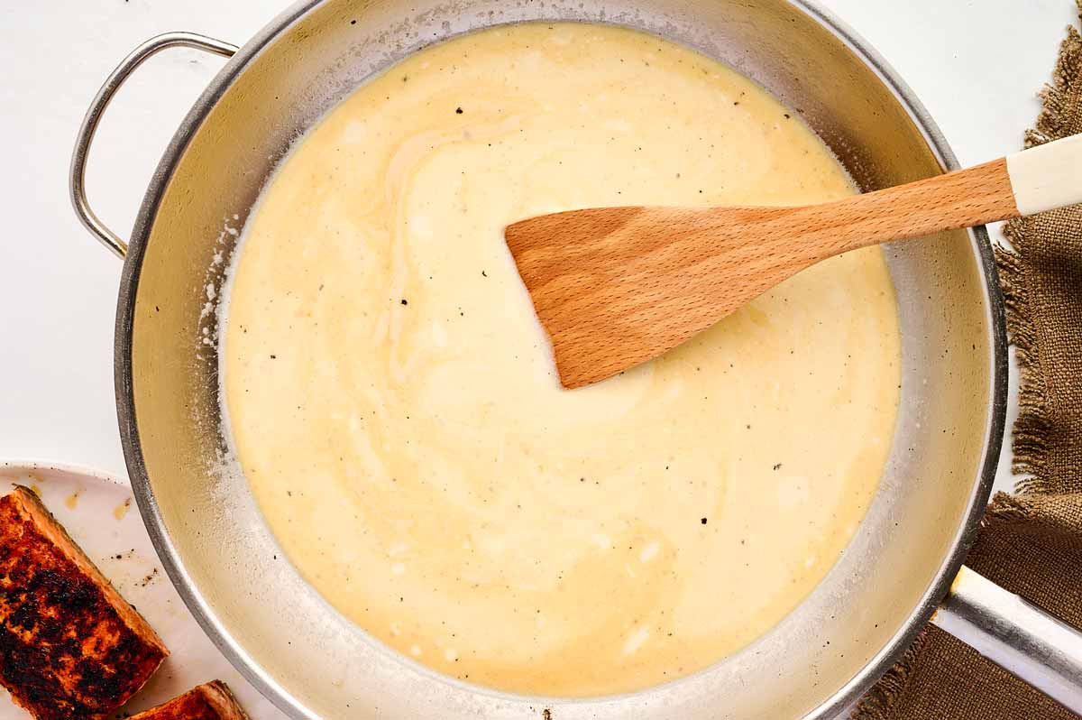 Cream sauce in skillet.
