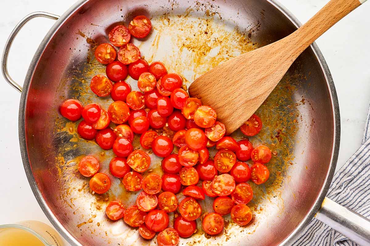 Sautéing tomatoes.