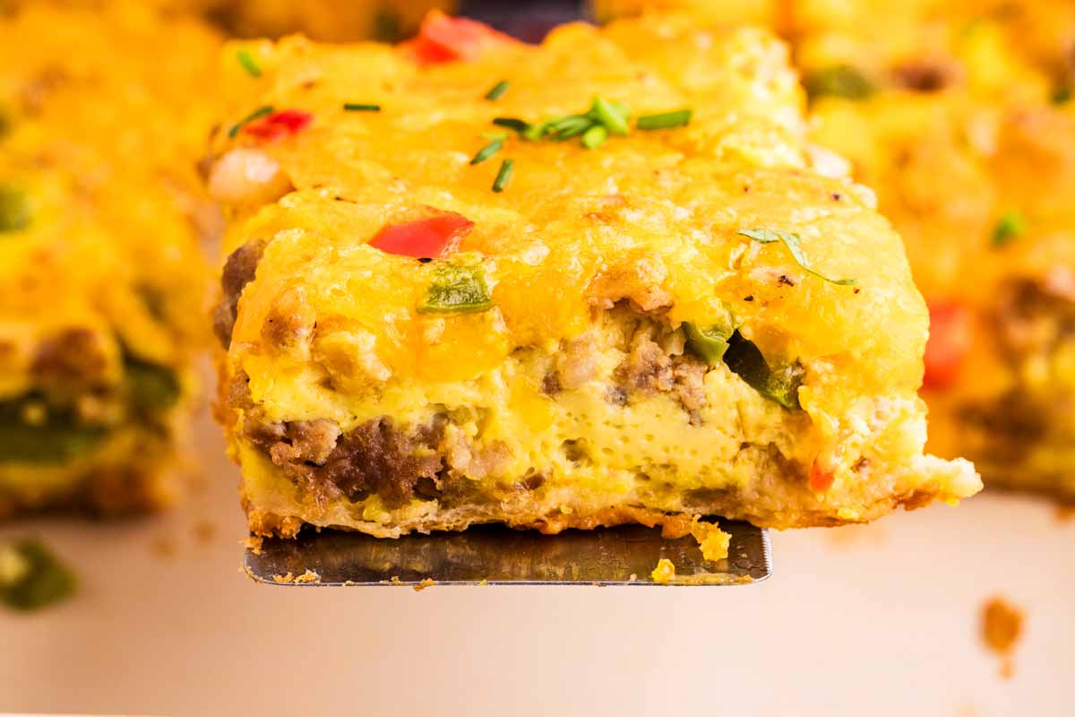 Serving breakfast casserole.