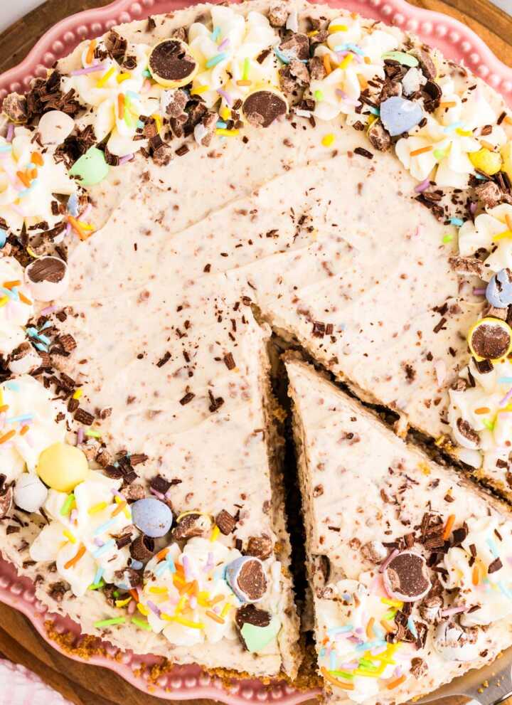 Mini Egg Easter Cheesecake with a slice cut.
