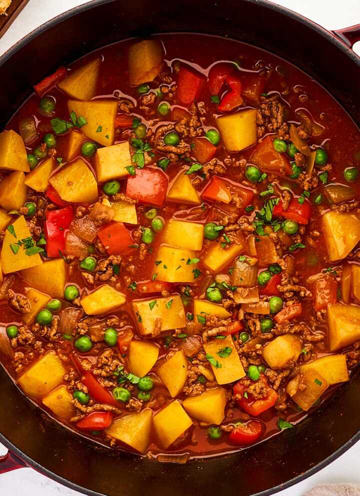 Pot with ground beef and potatoes stew.