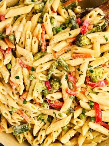 Pan filled with pasta primavera.