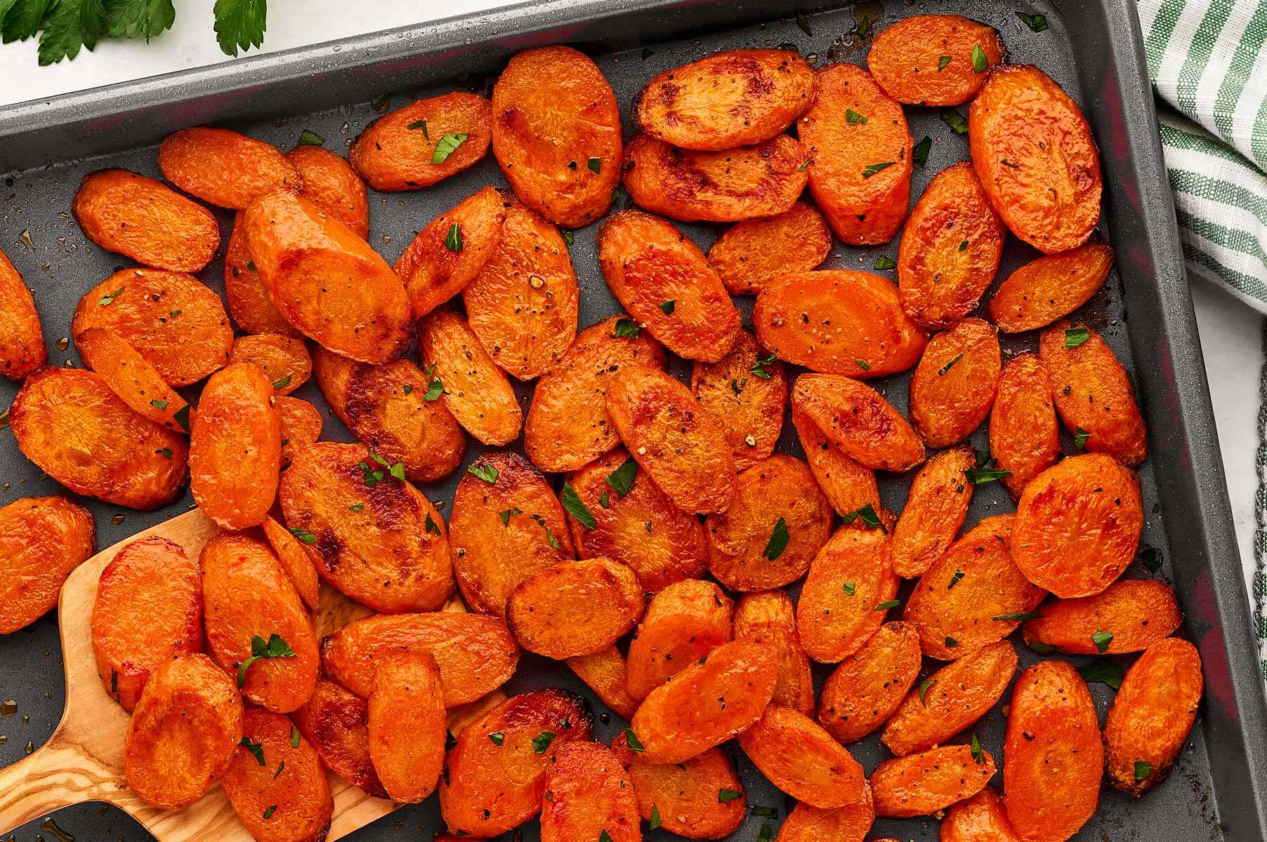 Sheet pan with roasted carrots.