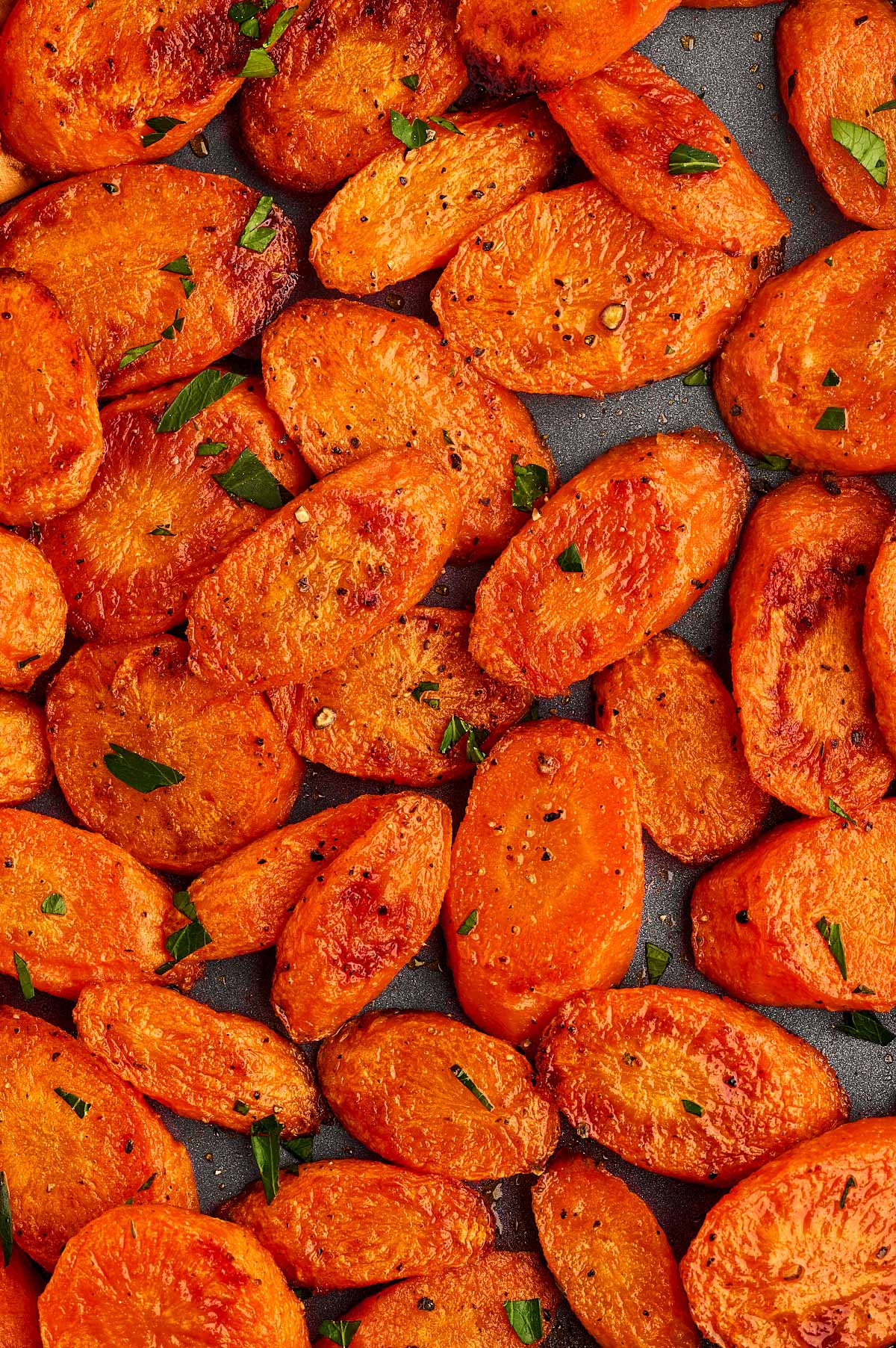 Close up view of roasted carrots.