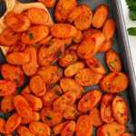 Sheet pan with roasted carrots.