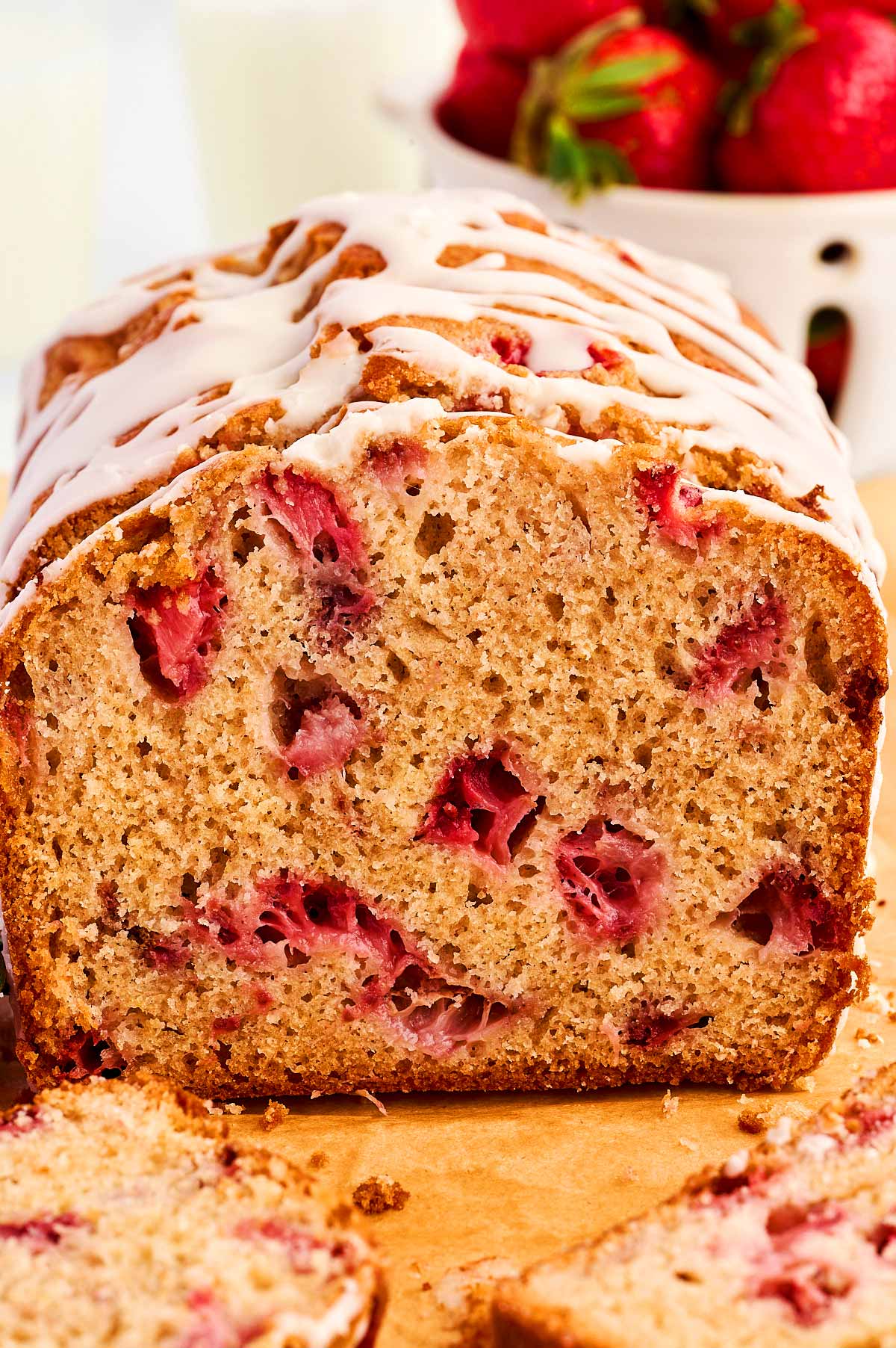 Loaf of sliced strawberry bread.