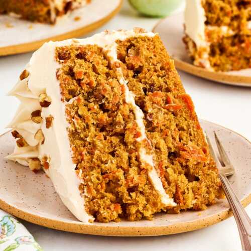 Slice of carrot cake on a plate.