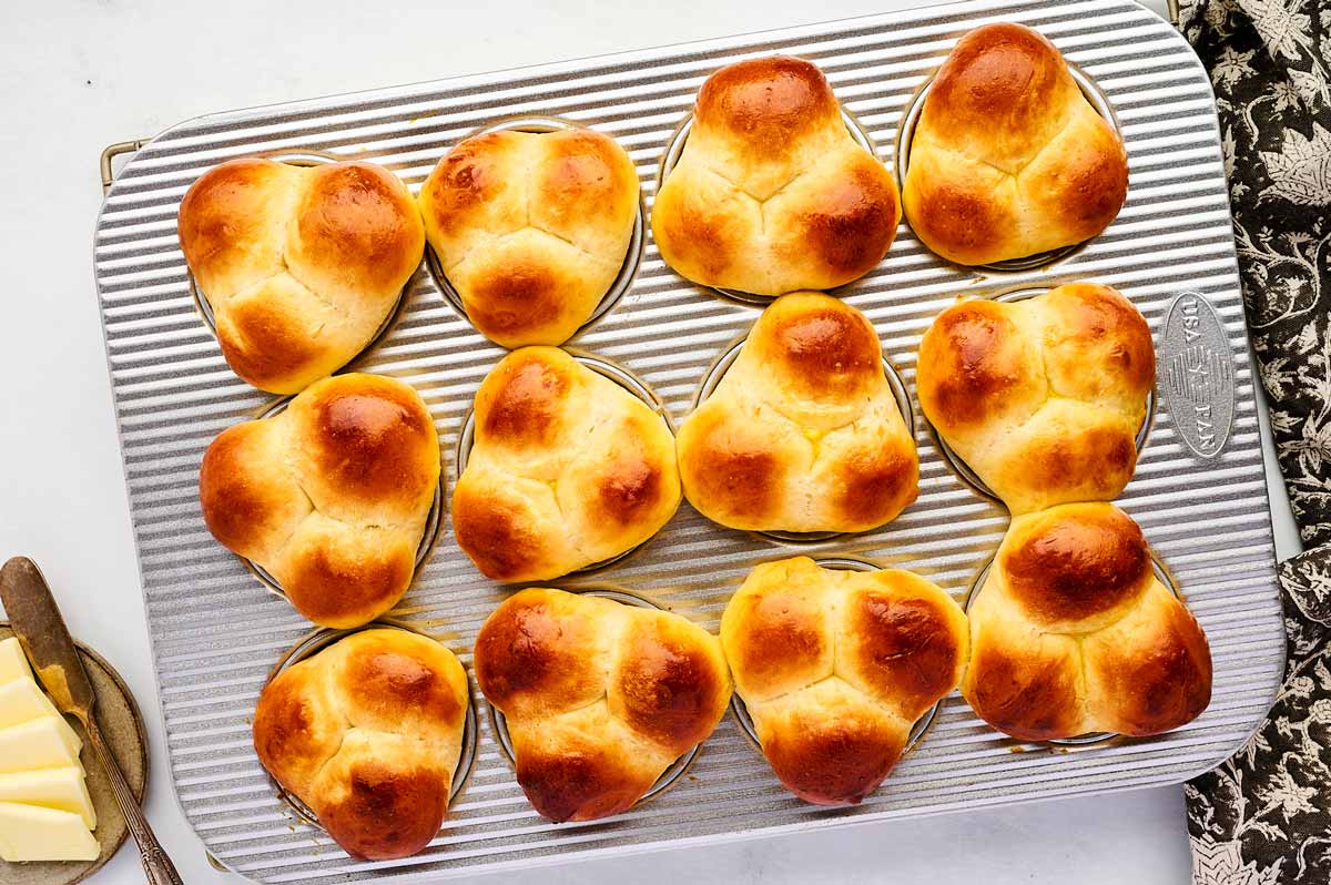 Baked cloverleaf rolls.