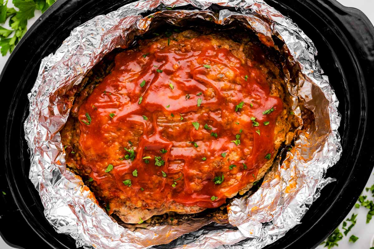 Meatloaf in crockpot with foil.
