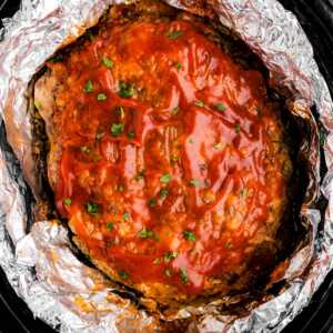 Meatloaf in crockpot with foil.