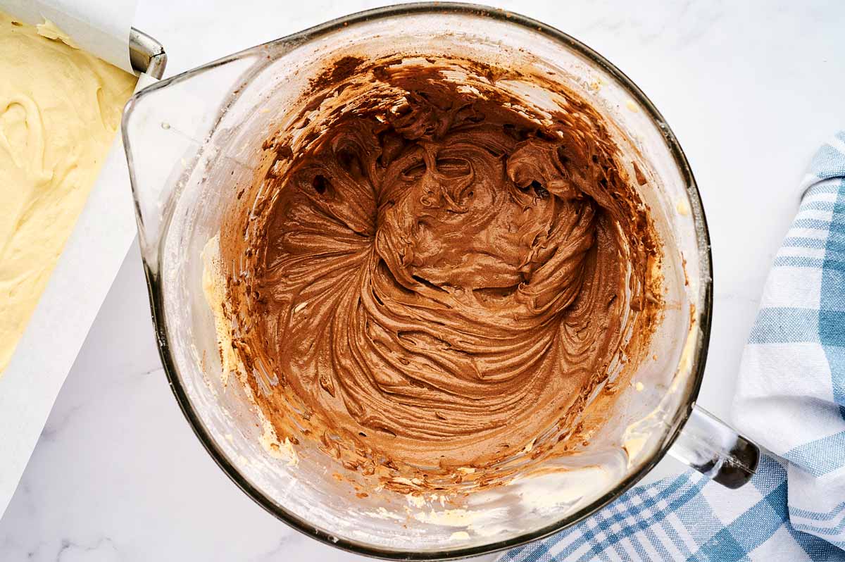 Chocolate batter in glass bowl.