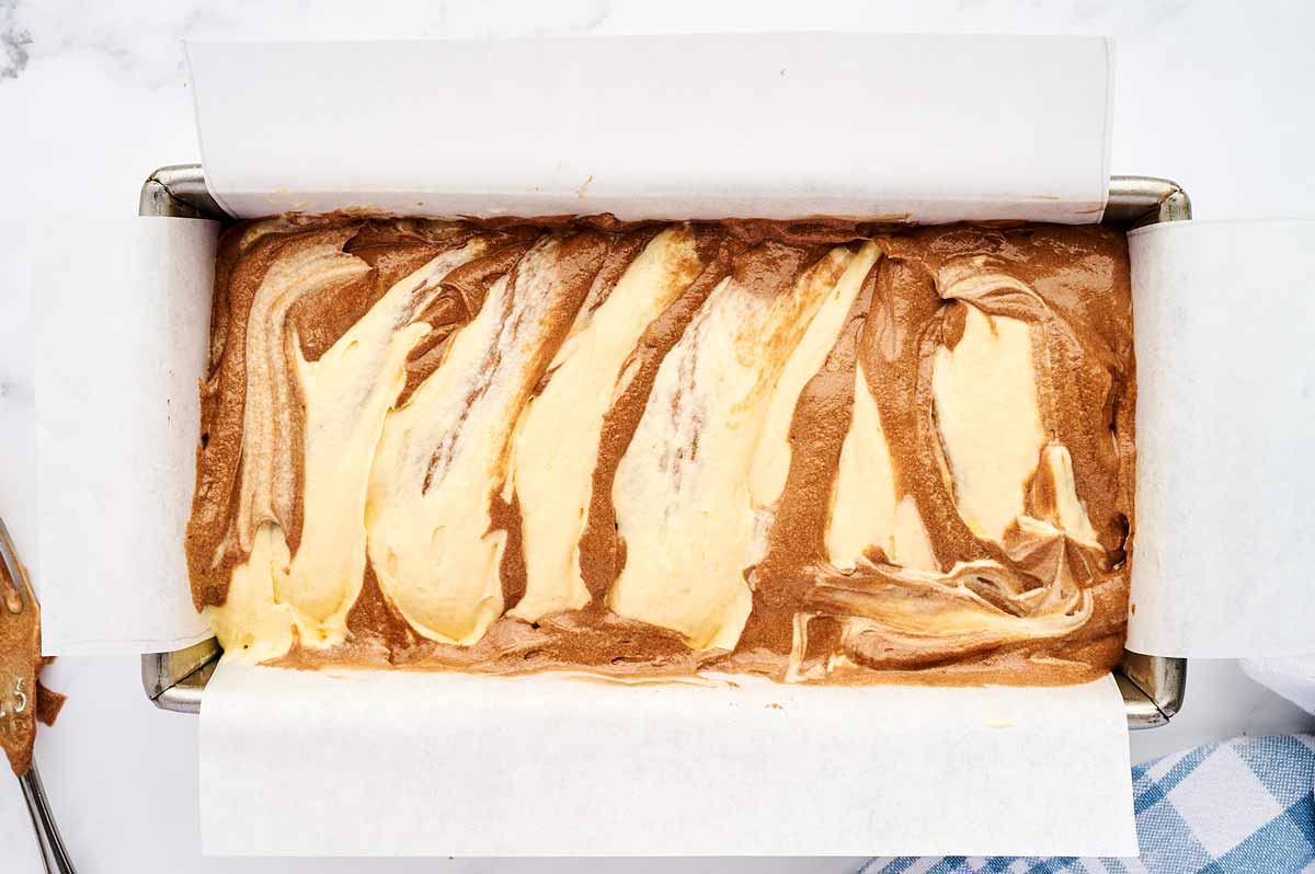 Unbaked marble loaf cake.